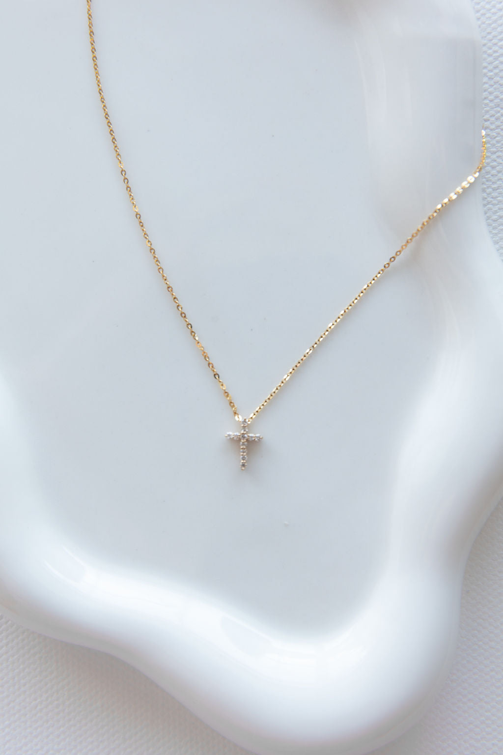 Dainty diamond hot sale cross necklace